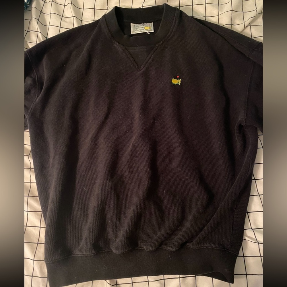 Masters crew neck. Is a large but fits bore like a medium.